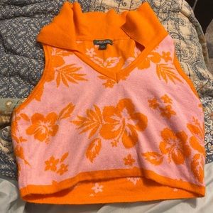 Orange crop top with flower designs